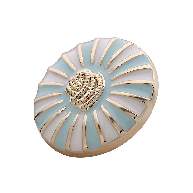 Round button: sky blue and white enamel daisy design with goldtone rim, front view