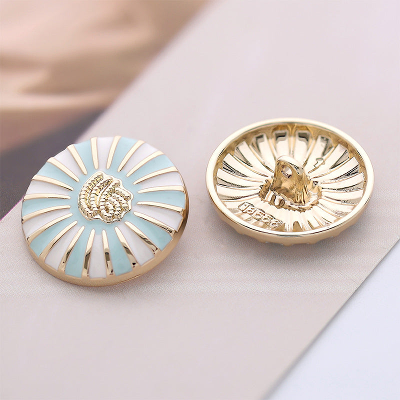 Two round buttons; one front shows sky blue enamel daisy, the other shows metal reverse