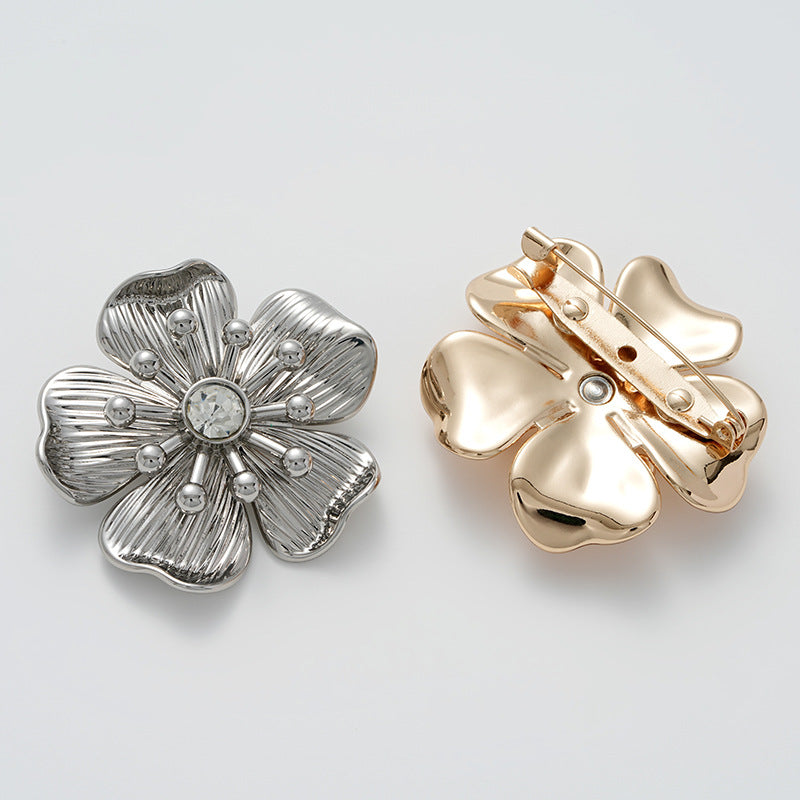 Flower brooch set: silver front and gold front with round rhinestone centers