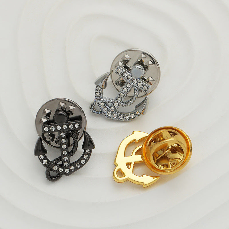 Diamond anchor collar pins, silver and black tones with clear rhinestone details