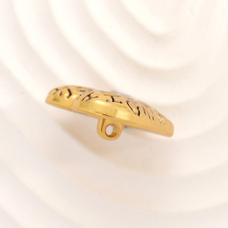 Gold heart-shaped metal button side view with shank and engraved letters
