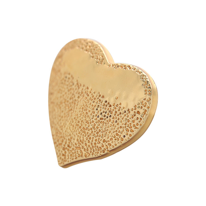 25mm gold heart metal sewing button, speckled texture, front view