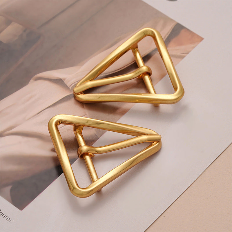 Pair of gold-tone triangular pin buckles with center bar for belt adjustment