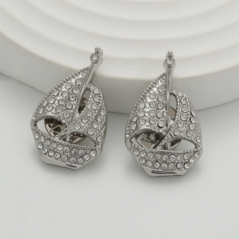 Set of two silver sailboat brooch pins with full rhinestone diamond detailing