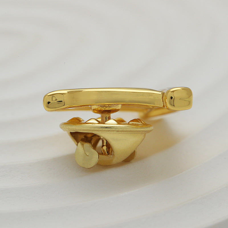 Gold boat-shaped brooch pin, side view with hinged clasp