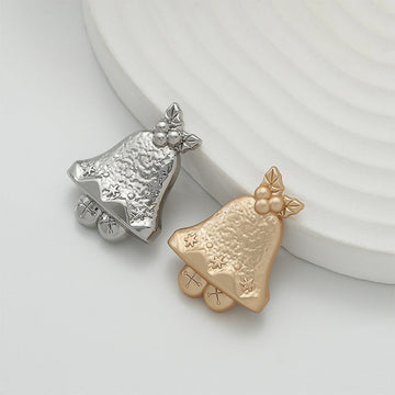 Vintage Christmas bell brooch set, matte gold and silver with star and bow details