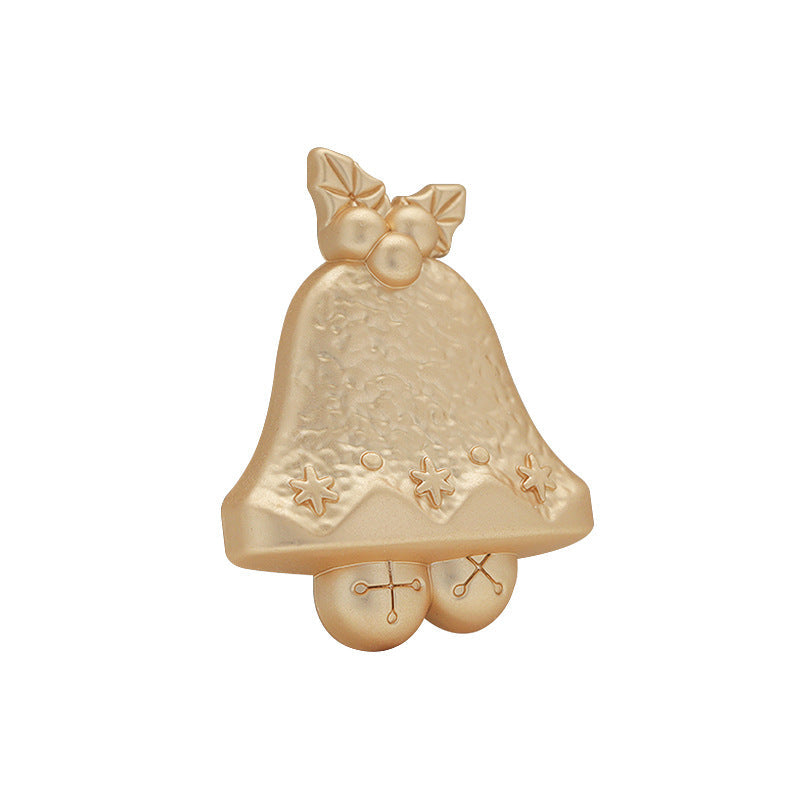 Matte gold Christmas bell brooch with bow topper, hanging dots, and star accents