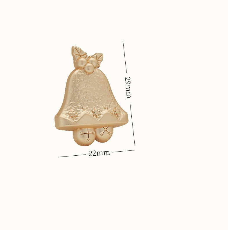 Gold Christmas bell brooch, 29mm height and 22mm width with bow and stars