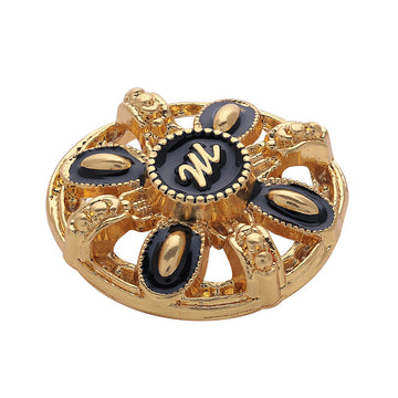 Vintage gold metal button, round hollow design with black letter M center
