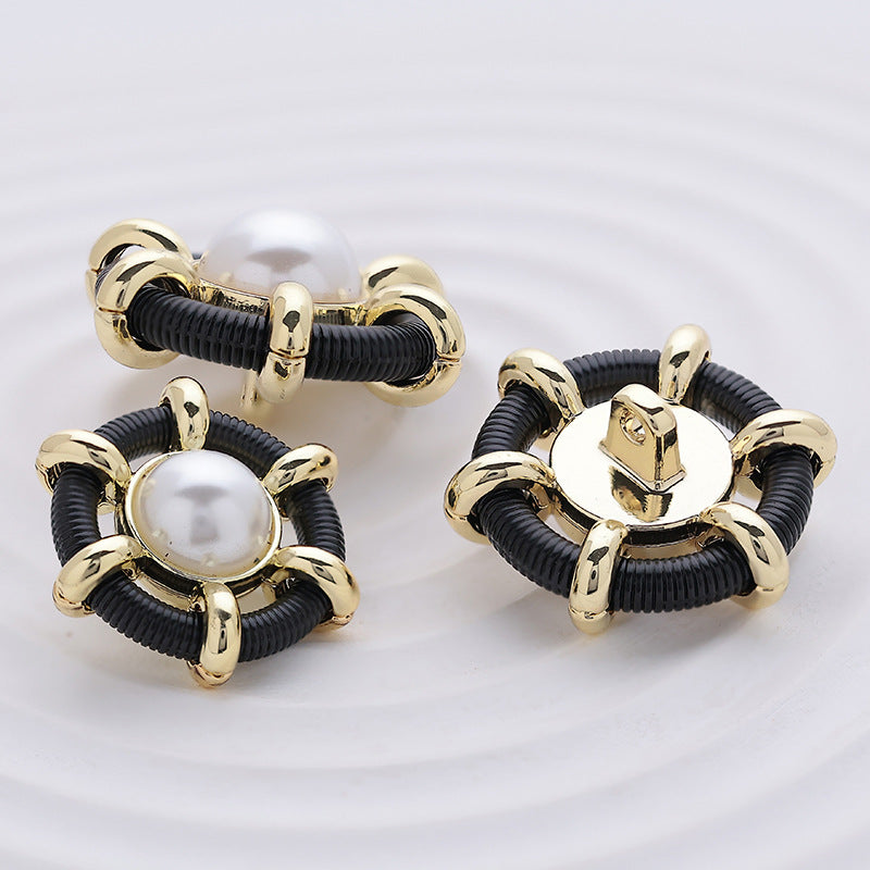 Hollow pearl sewing buttons set view: black ribbed ring, pearl center, gold frames