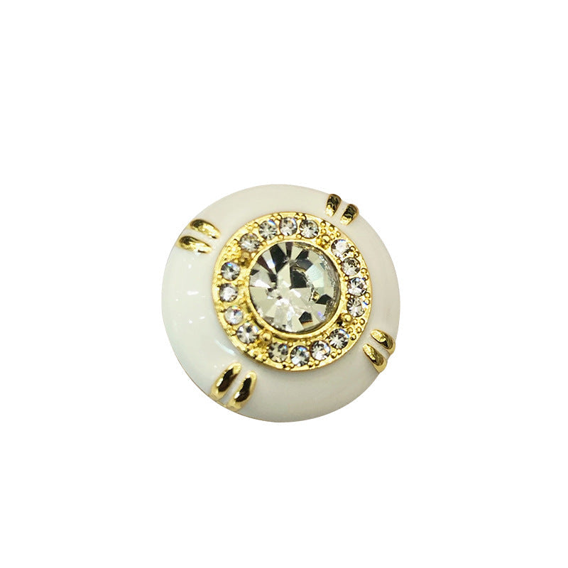 White sewing button: rhinestone center, gold-tone diamond border