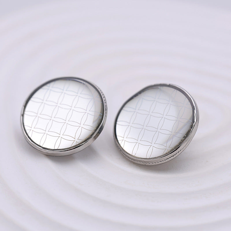 Two 20mm silver round metal buttons with rainbow check geometric pattern, front view