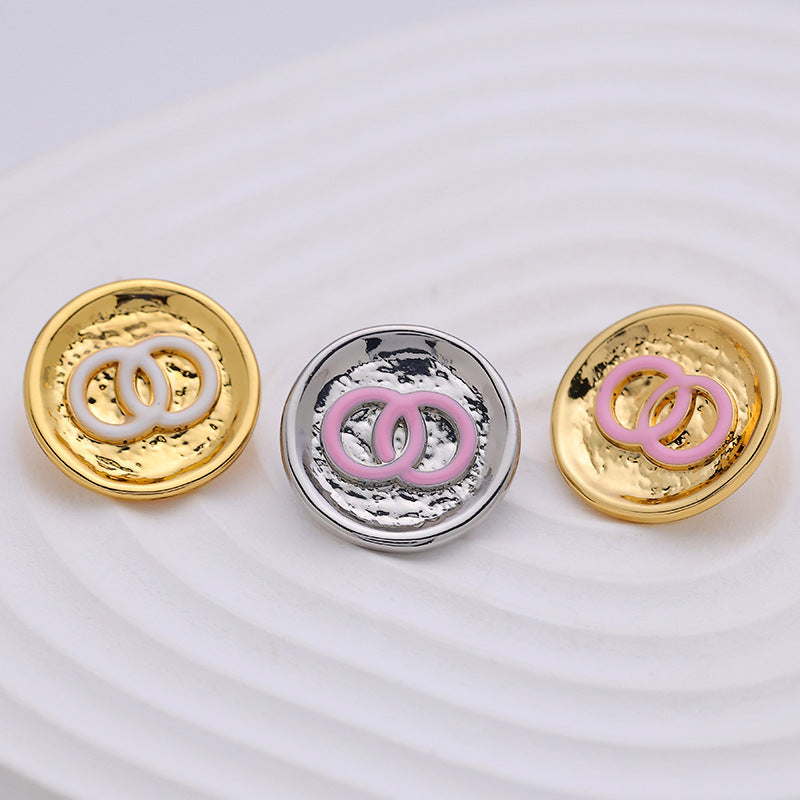 Double-circle metal button set: white gold, pink gold, and pink silver with enamel center