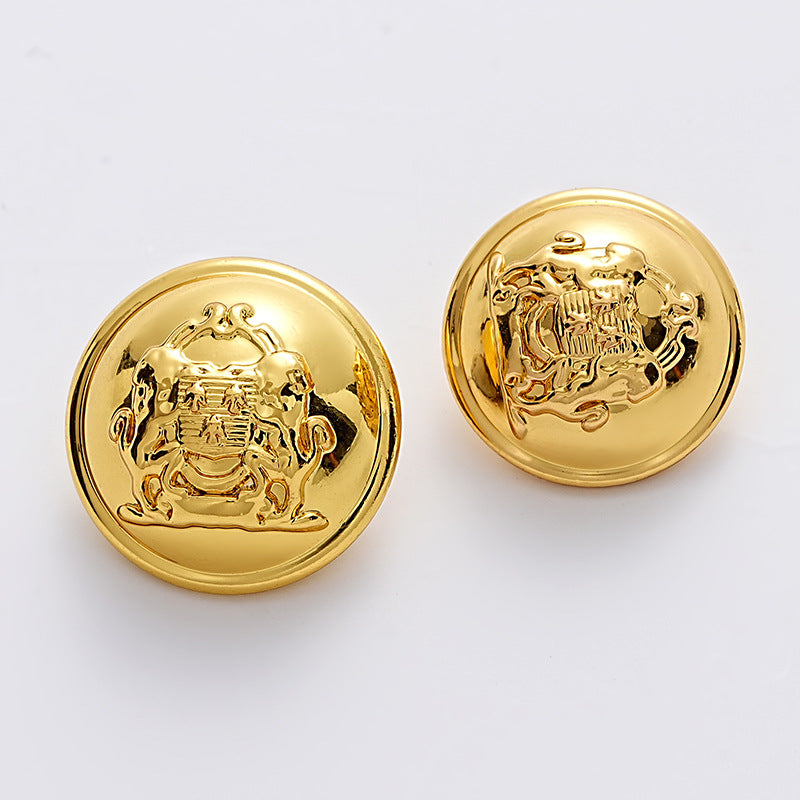 Pair of gold lion crest metal buttons, embossed double-lion shield design