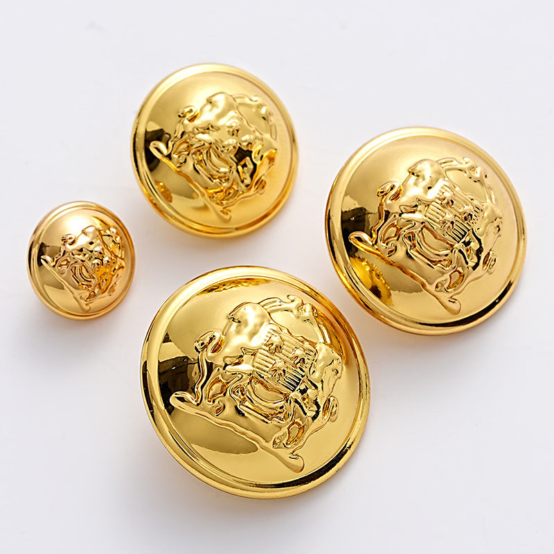 Gold lion crest metal buttons, embossed double-lion shield relief, angled views