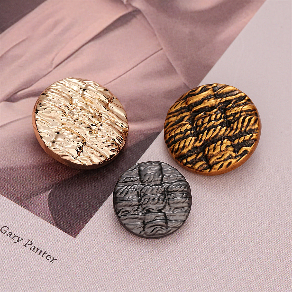 Round metal buttons with striped texture in antique gold and dark tones, set of 10