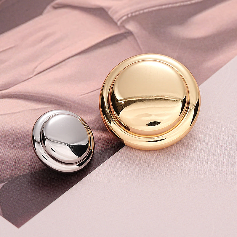 Gold round metal button with hollow-back, reflective dome finish