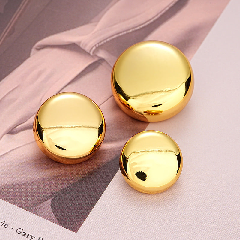 Gold hollow decorative buttons, smooth domed fronts, three buttons shown