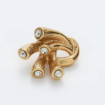 Gold metal antennae button with irregular shape and 5 rhinestone gems