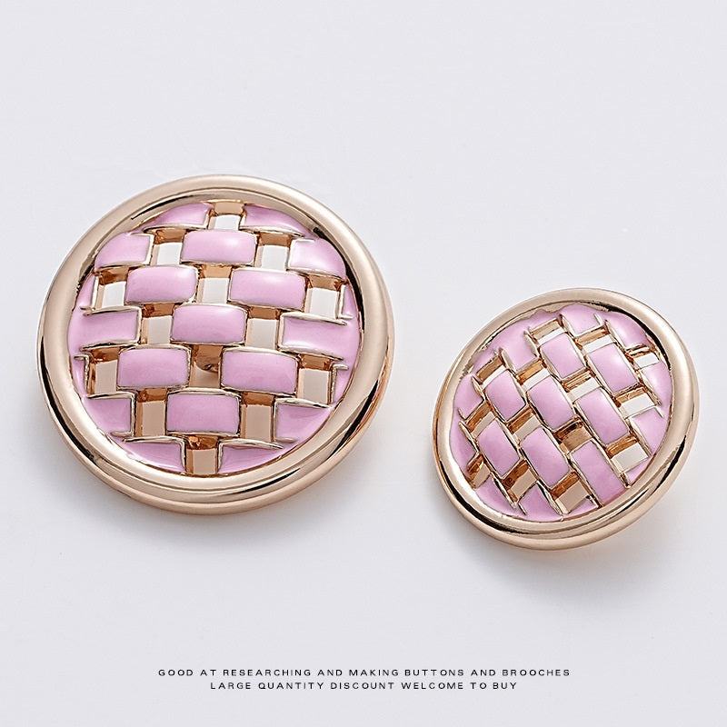 Pink woven grid metal button with gold trim