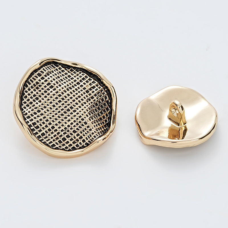 Gold metal button front with corrugated gauze texture and matching gold back.