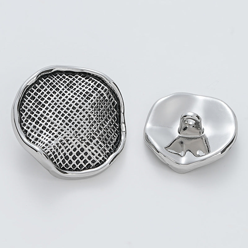 Silver metal button front with corrugated gauze texture and matching silver back.