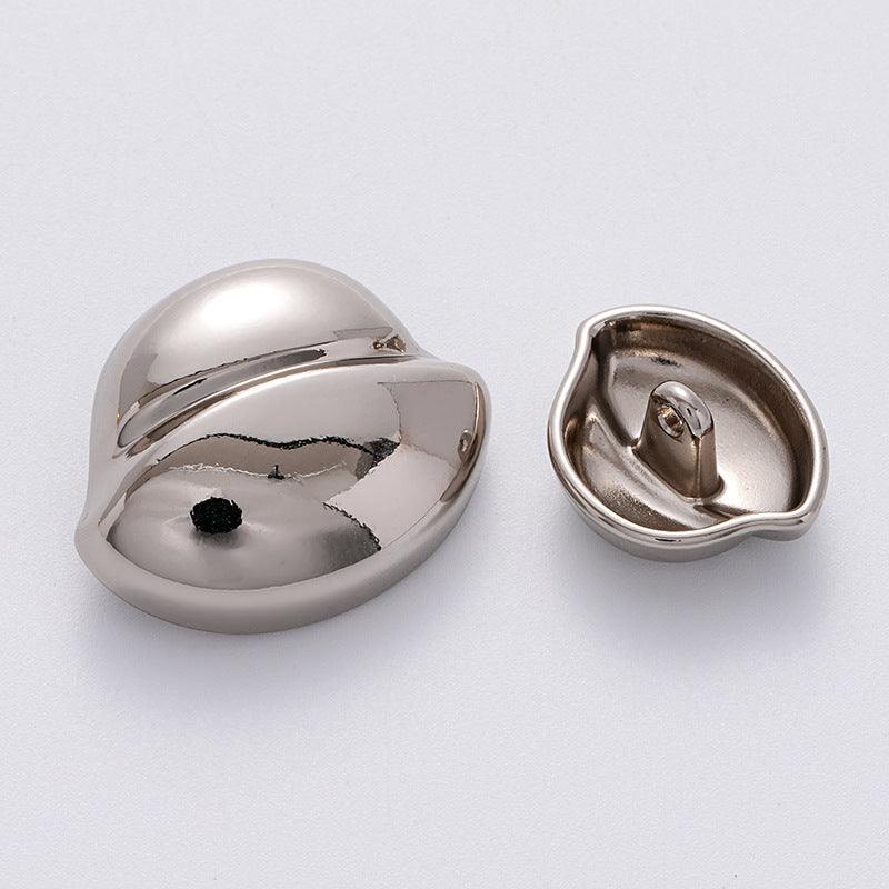 Silver clam-shell metal button front view with black center rivet