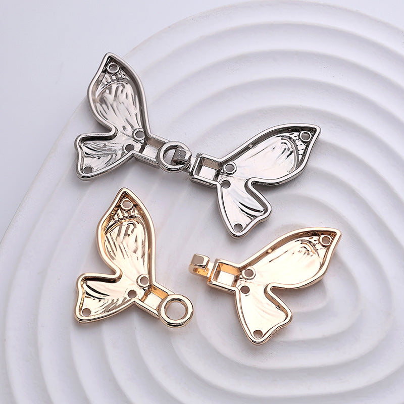 Decorative dress buckles in gold and silver, butterfly bow design with metal clasp