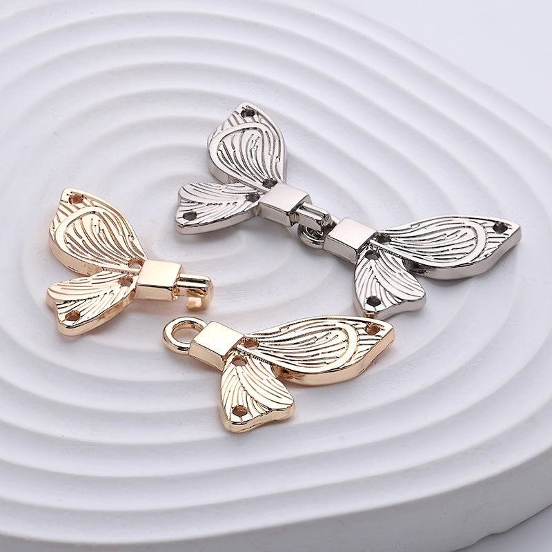 Gold and silver butterfly bow dress buckles with metal clasp and small eyelet ring
