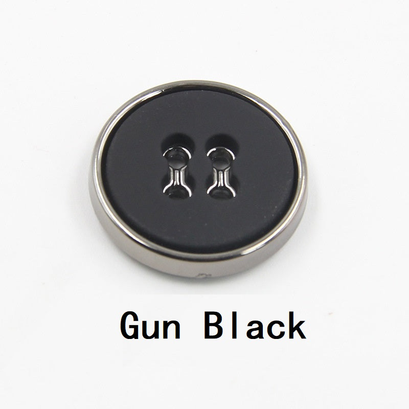 Gun black round plastic button with four-hole design and gunmetal edge