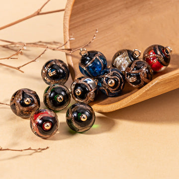 Glazed bead Chinese cheongsam buttons, gold-toned shanks, mix of dark blue and brown tones