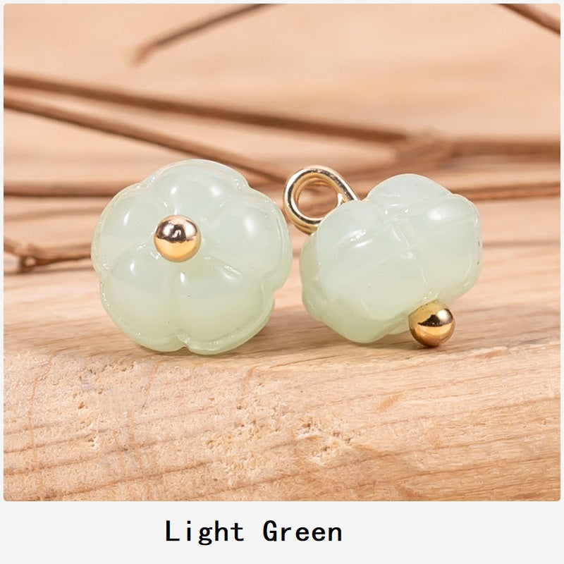 Light green pumpkin-shaped glazed cheongsam buttons, gold-tone posts and loops