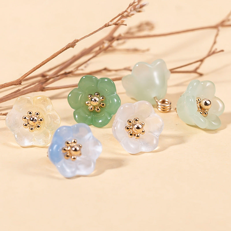 Chinese glaze lily-of-the-valley buttons, assorted colors set of 49, gold-tone centers.