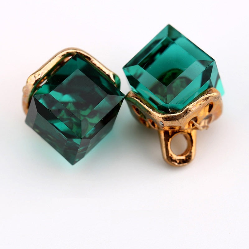 Square crystal mini buttons, green with gold-tone setting, 2 visible