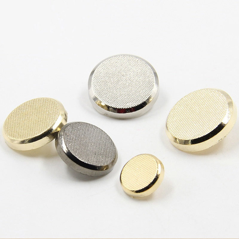 Round textured metal coat buttons in gold, silver and gunmetal, mixed sizes