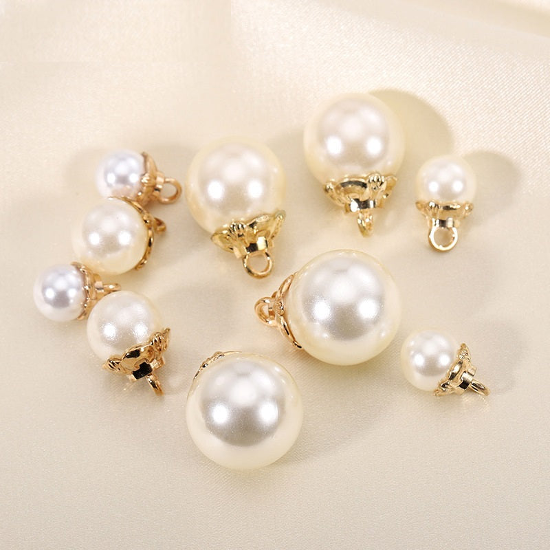 White pearl buttons with gold-tone metal loop backs, 9–16mm (set of multiple)