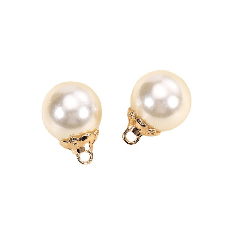 Pair of 9–16mm white pearl buttons with gold-tone metal base and loop backs
