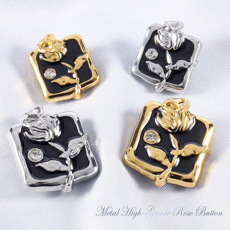 Silver-tone and gold-tone rose rhinestone metal buttons with black enamel and clear gems