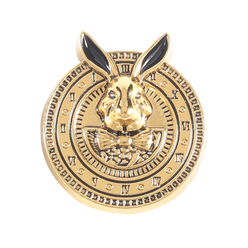 Gold-tone rabbit-head coat button with black enamel ears and detailed bow emblem