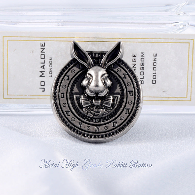 Silver-tone rabbit-head coat button with black enamel ears and engraved outer ring
