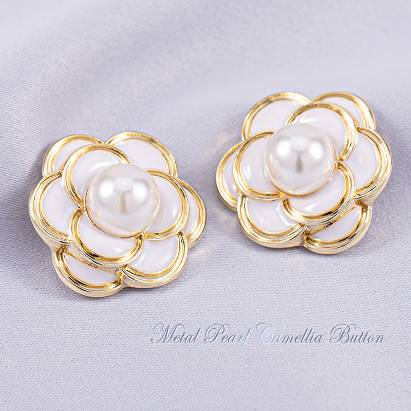 White pearl camellia shank button with gold-tone metal petals and round pearl center
