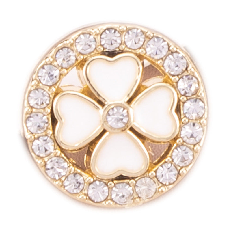 Golden rhinestone shirt button with white five-petal flower and clear crystal border