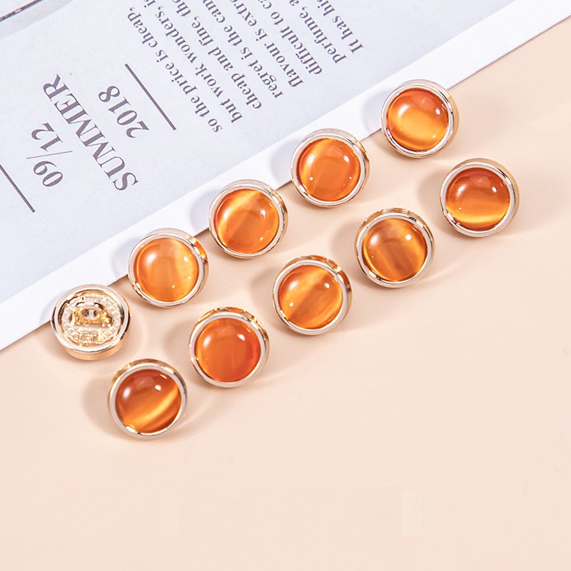 16L cat's eye stone pearlescent metal shirt buttons, warm orange tones