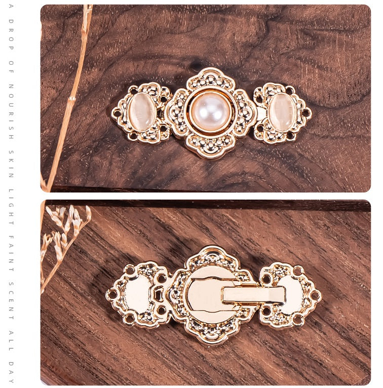 Embossed flower metal buttons with faux pearl stones; front and clasp back view