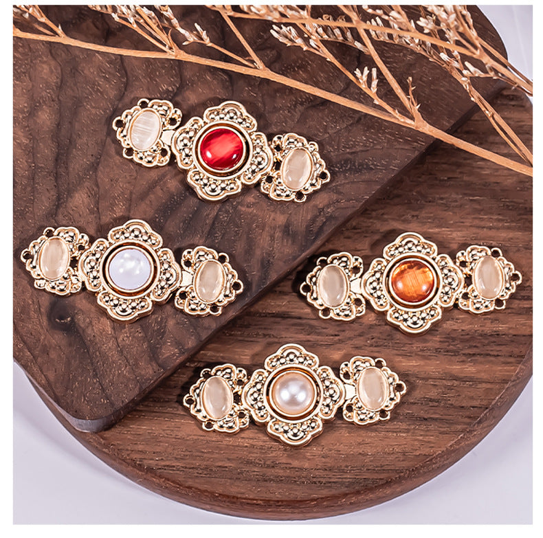 Embossed flower metal buckle buttons, 8-pack with red, white, amber and peach stones