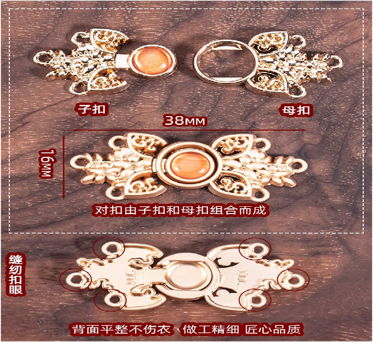 Filigree cat’s eye buckle set with round stones; 38mm center and loop/peg pieces.
