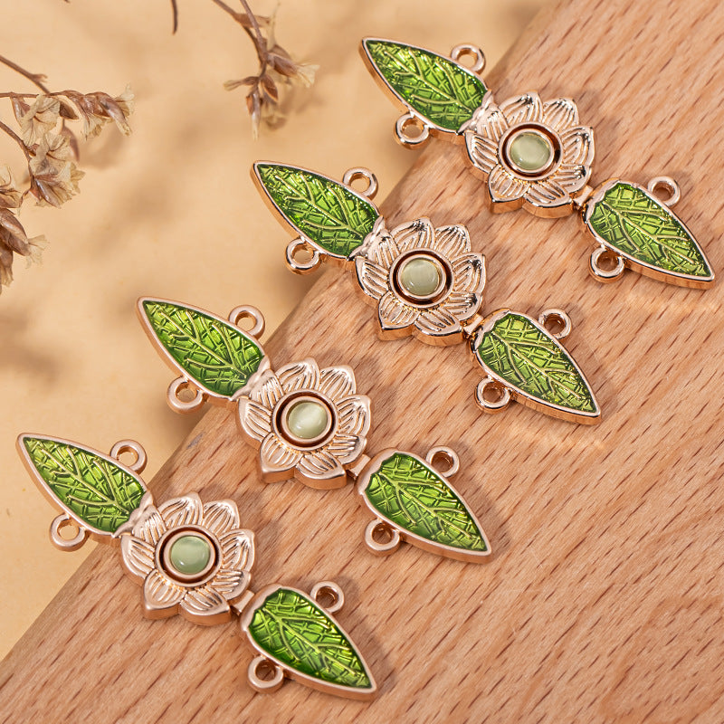 Set of green leaf cat’s eye lock buttons with flower centerpiece and metal loops