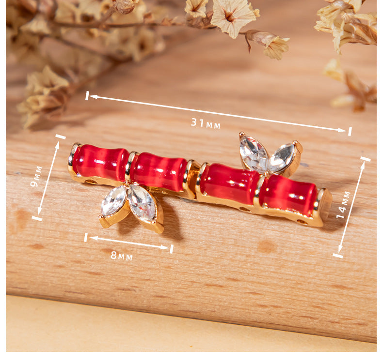 Roter Bambusknoten-Metallknopf mit Katzenaugen-Steinbesatz und Strass, mit Maßen