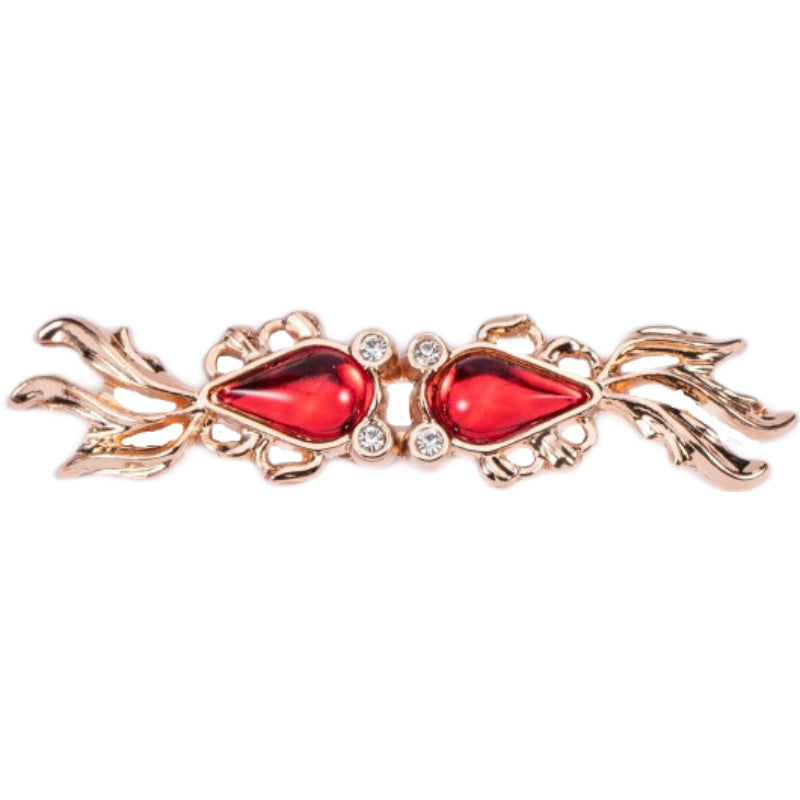 Goldfish-shaped frog closure button with red cabochon, gold-tone filigree, rhinestones