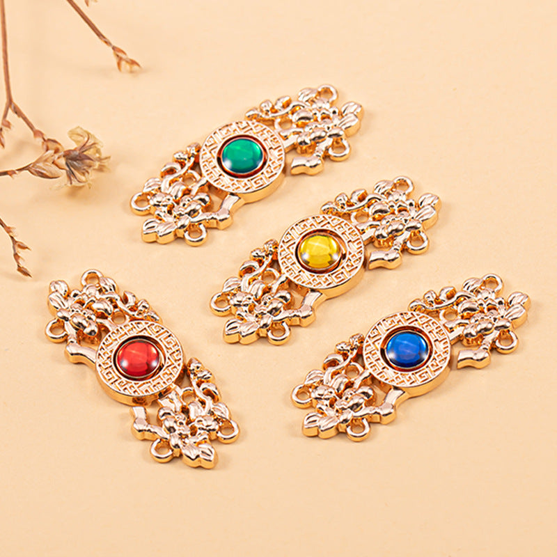 Copper Chinese knot metal buttons with green and yellow cat’s-eye stones, ornate filigree